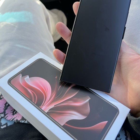 Sleek Black Smartphone with Box